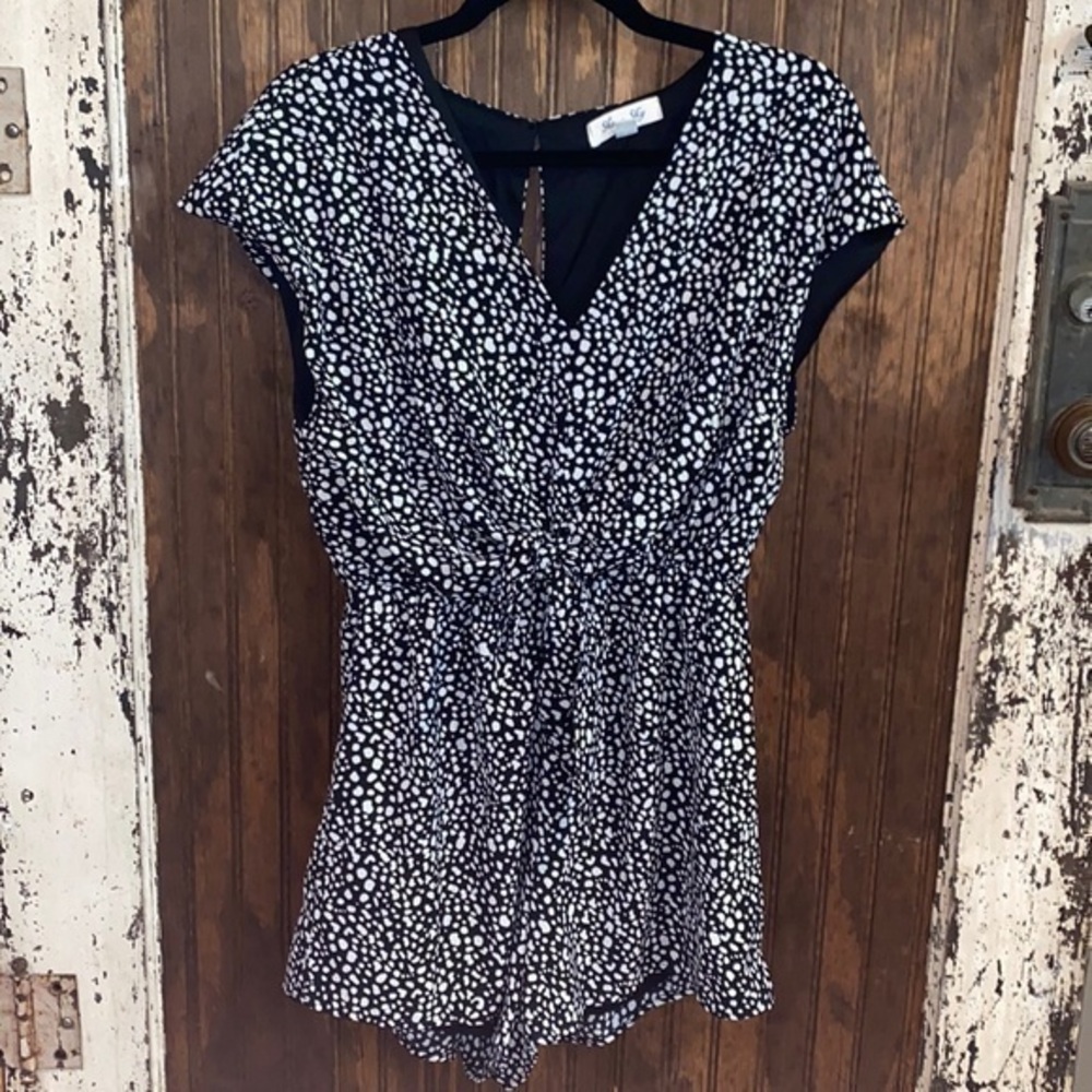 She + sky leopard romper